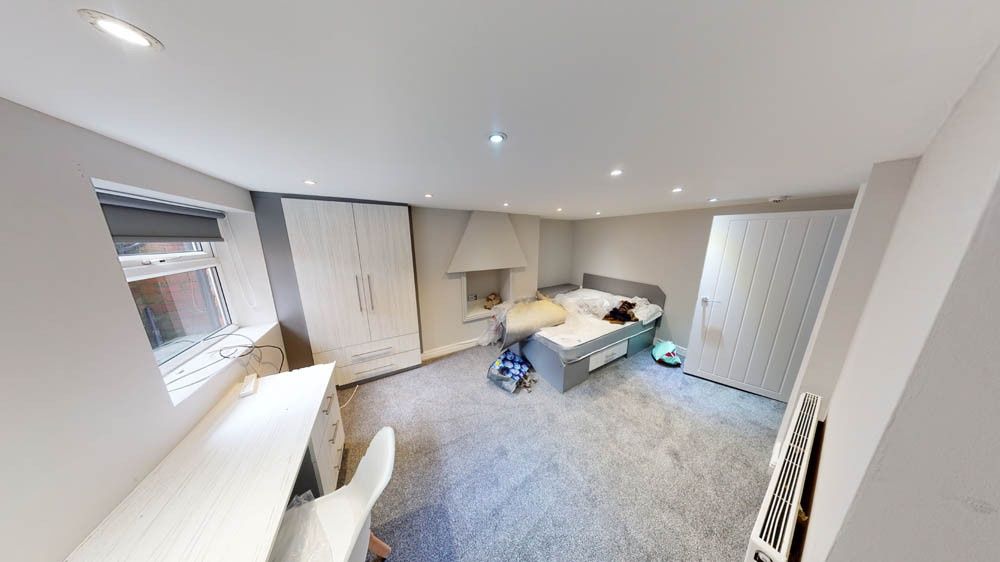 Property photo 2 of 14 Bright And Spacious Living Room Featuring Comforta...