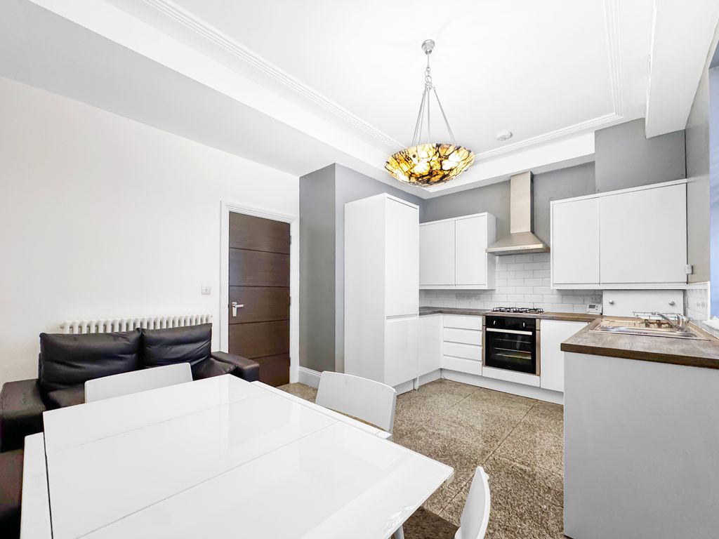 Property photo 3 of 10 Kitchen Living