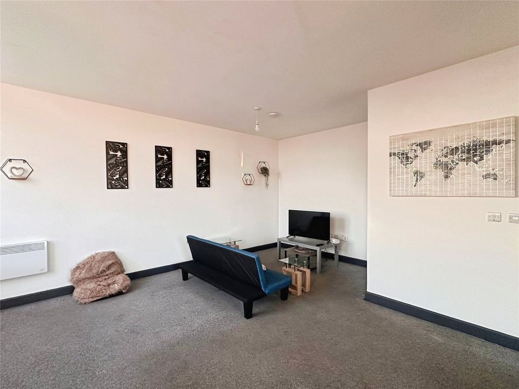 Property photo 1 of 6 Living Area