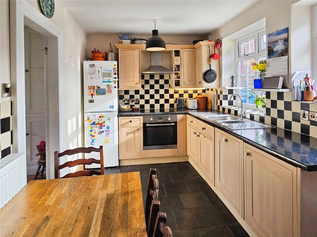 Property photo 3 of 13 Dining Kitchen