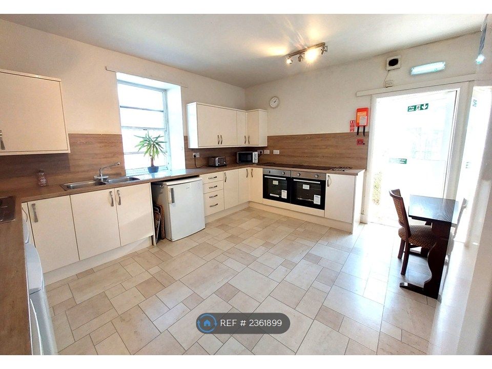 Property photo 3 of 11 Upper Kitchen