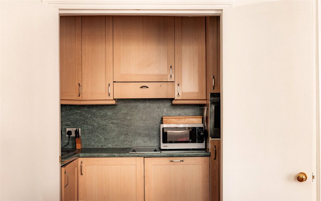 Property photo 3 of 9 Kitchen