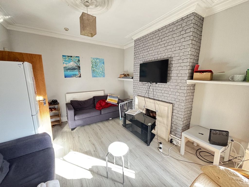Property photo 3 of 19 Bright And Welcoming Living Room Featuring Modern ...