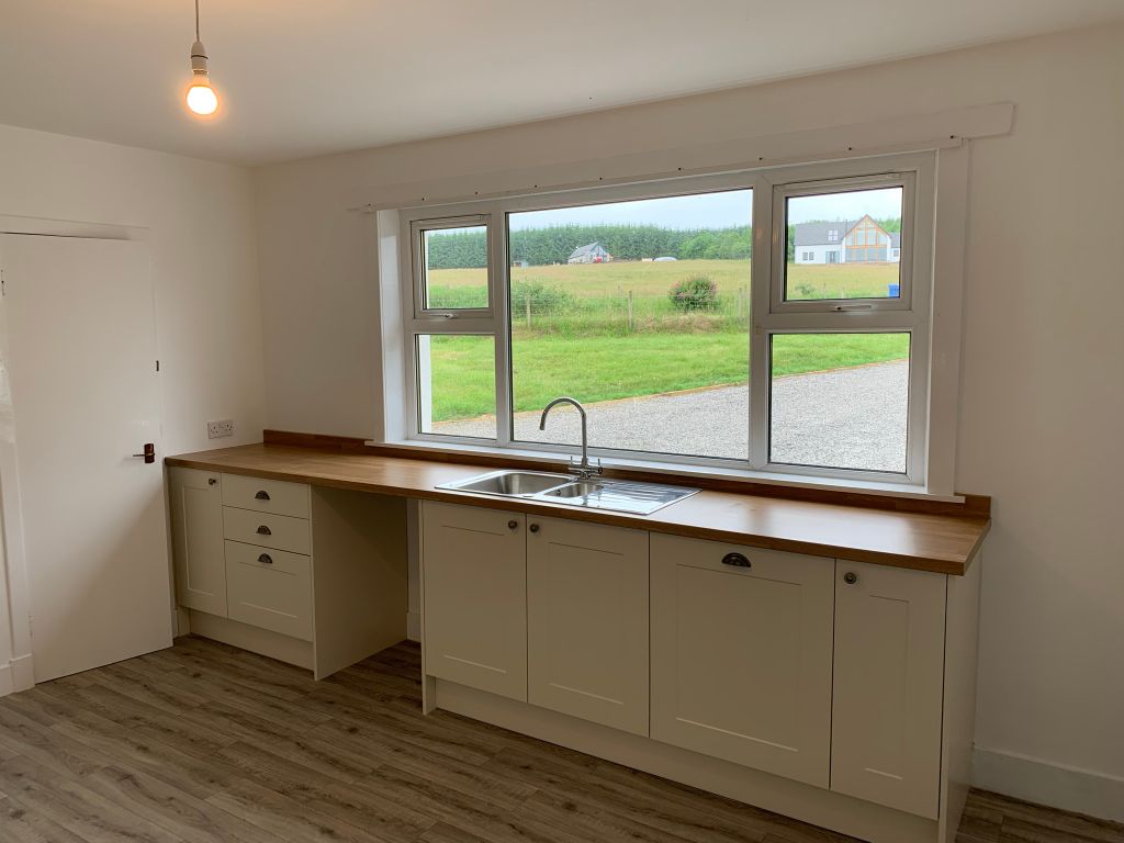 Property photo 2 of 8 Kitchen