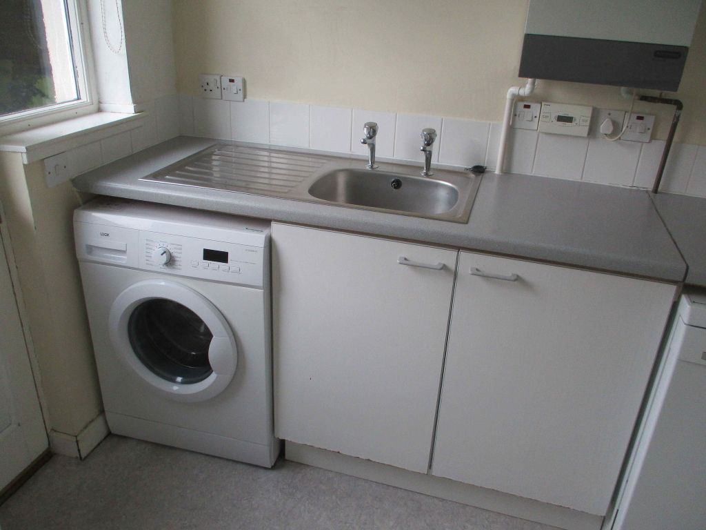 Property photo 3 of 8 Utility Room