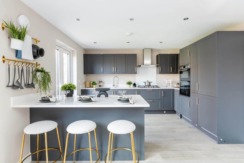 Property photo 1 of 14 A Breakfast Bar In The Kitchen Offer Space To Grab A Quick Bite Or Catch Up With The Family
