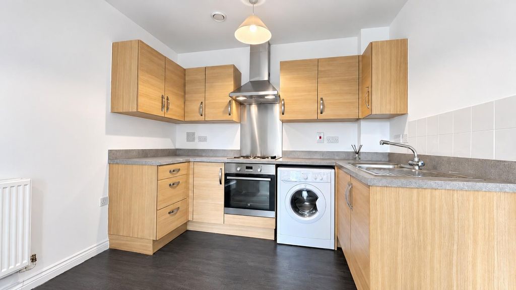Property photo 3 of 11 Kitchen Area