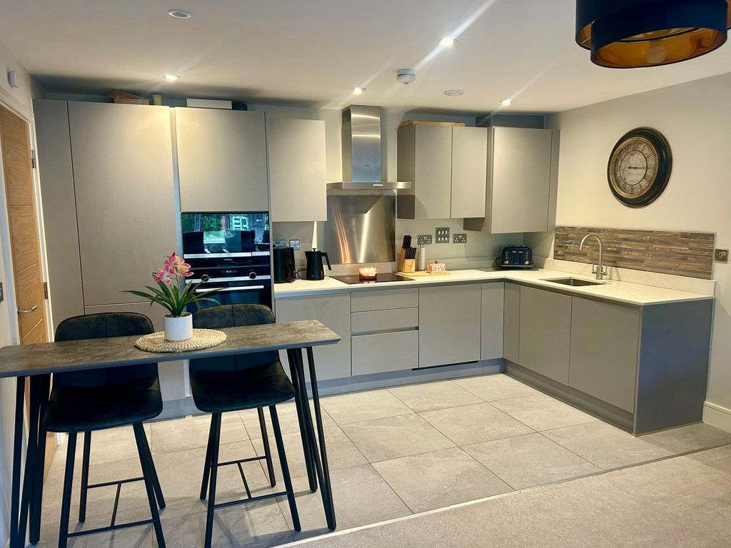 Property photo 2 of 16 Integrated Kitchen Area