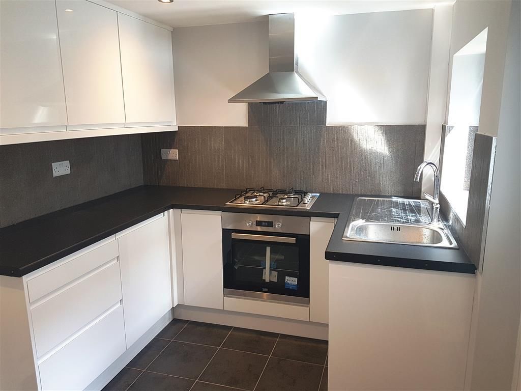 Property photo 3 of 12 Kitchen