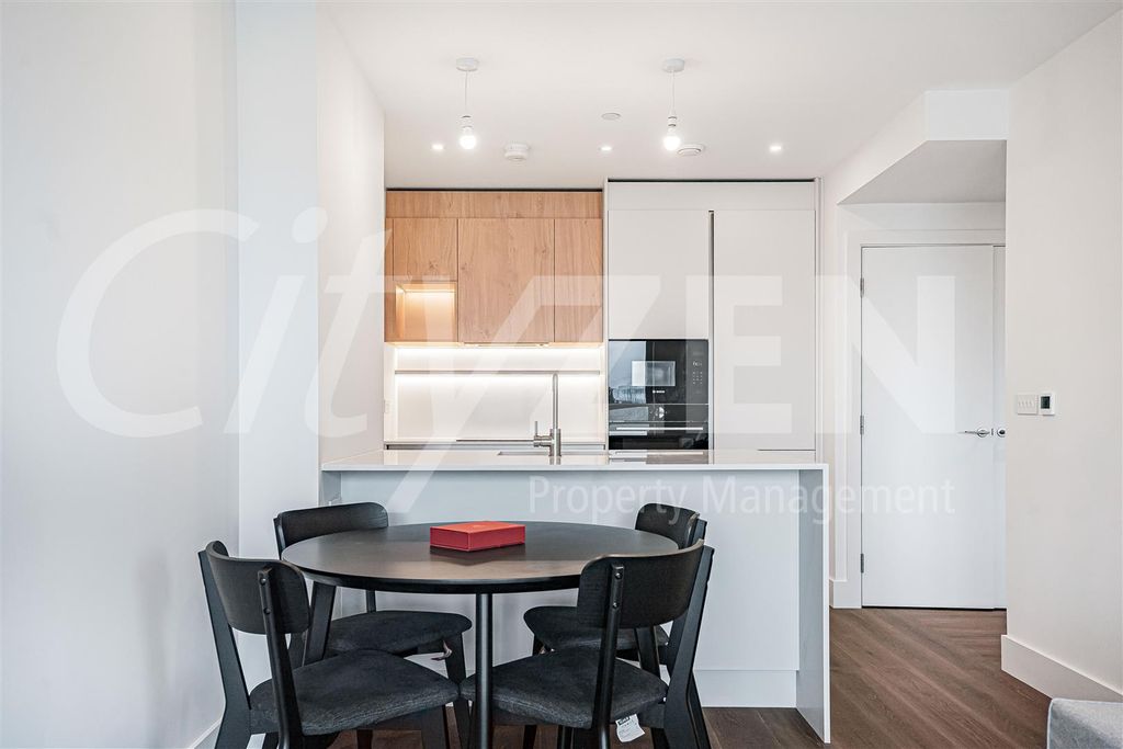 Property photo 2 of 24 Dining Area/Kitchen