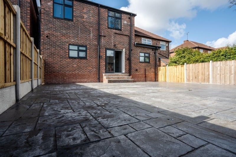 Property photo 3 of 9 Spacious Outdoor Garden Area Featuring Well-Mainta...