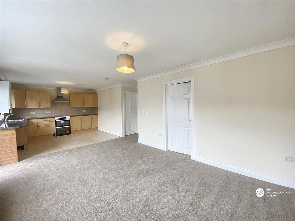 Property photo 2 of 13 Living Area