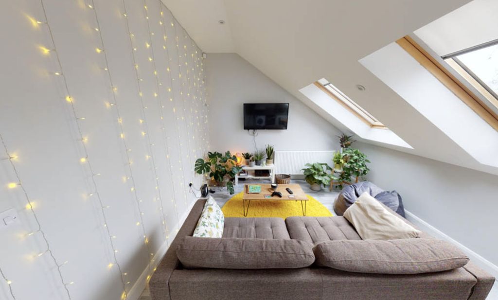 Property photo 1 of 6 Bright And Spacious Living Room Featuring An Elega...