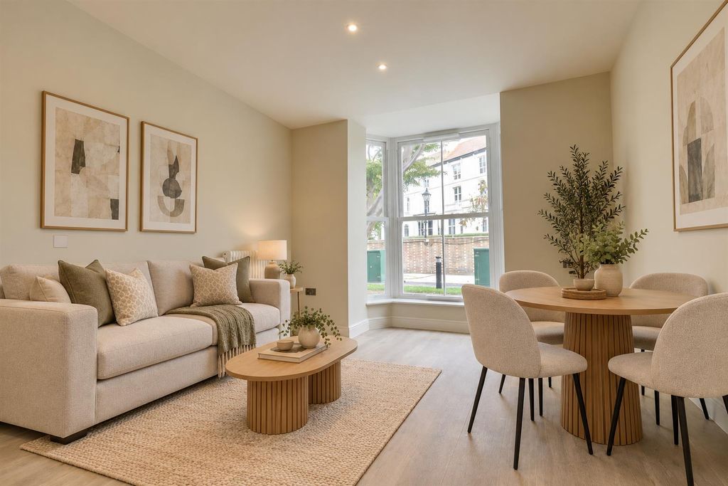 Property photo 3 of 10 Warm Scandinavian Bay Window Living Space.Png