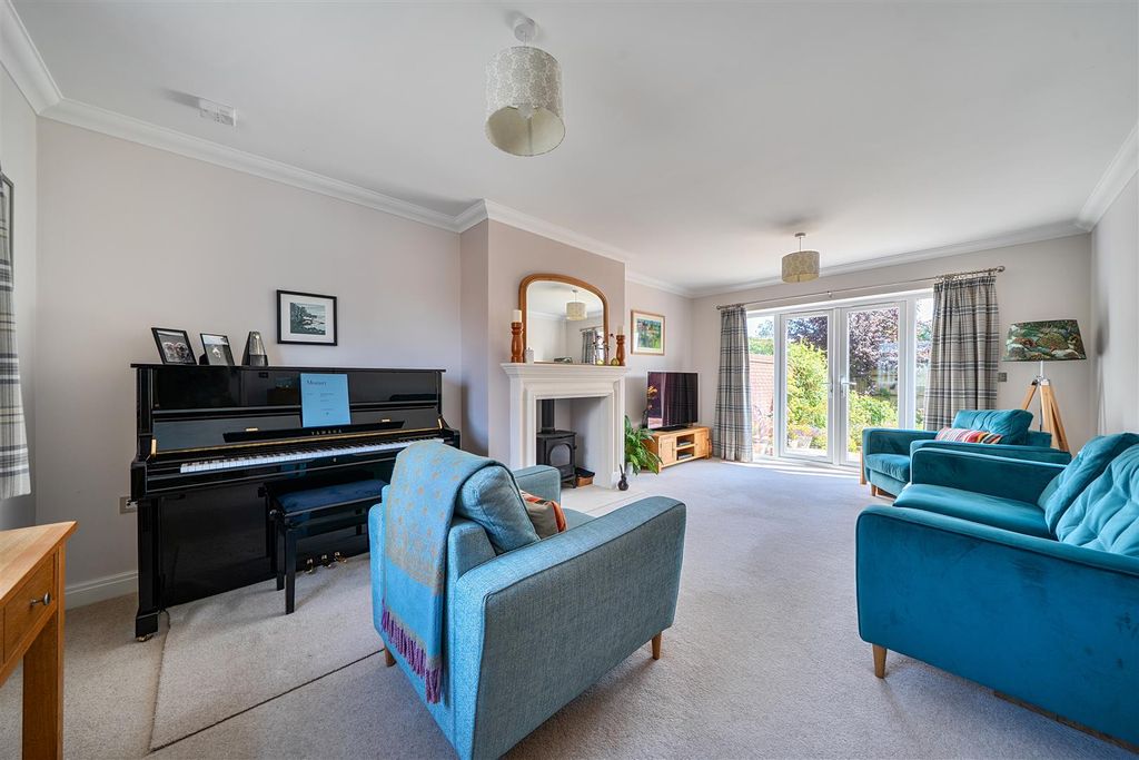 Property photo 3 of 19 Sitting Room With Woodburner