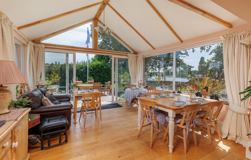 Property photo 3 of 36 Dining Room/Conservatory With Doors Opening To Gar