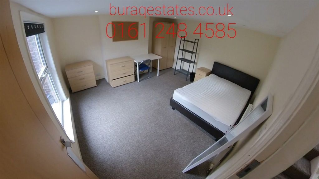 Property photo 2 of 15 Bright And Spacious Master Bedroom Featuring A Com...
