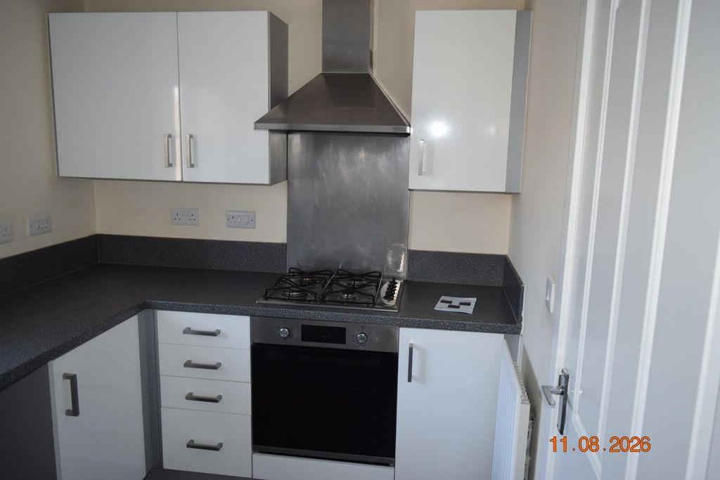 Property photo 2 of 12 Kitchen