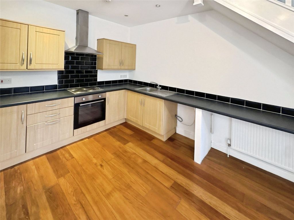 Property photo 3 of 9 Kitchen