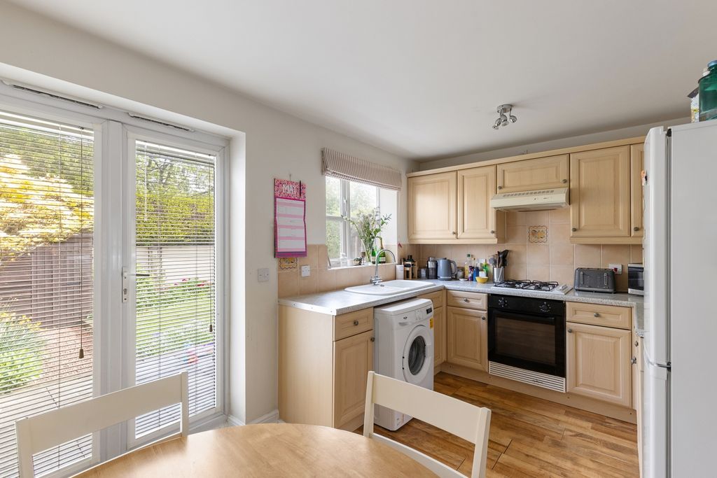 Property photo 3 of 12 Kitchen Dining Room