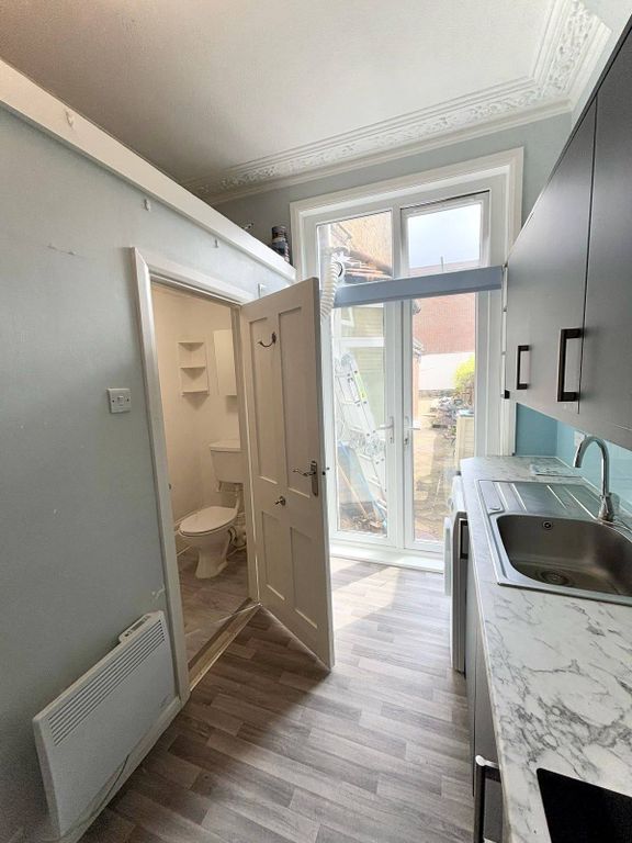 Property photo 3 of 8 Kitchen