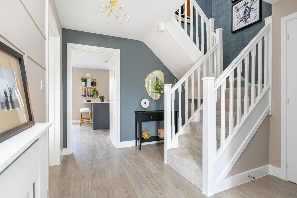 Property photo 2 of 14 A Welcoming Entrance Hall With Feature Staircase