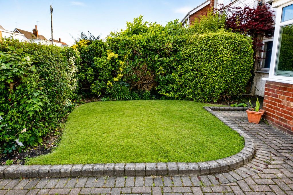 Property photo 2 of 25 Garden Front.Png