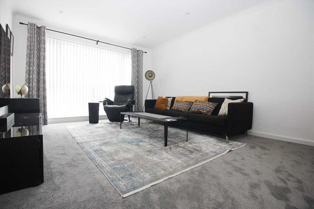 Property photo 3 of 8 Living Room