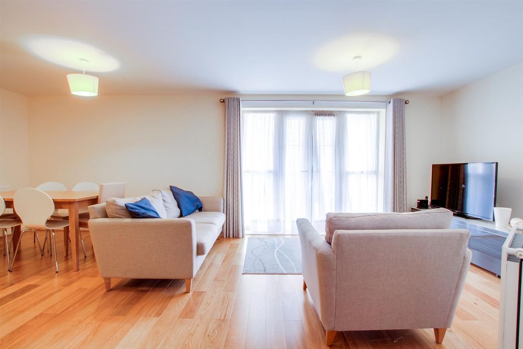 Property photo 3 of 12 Living Area