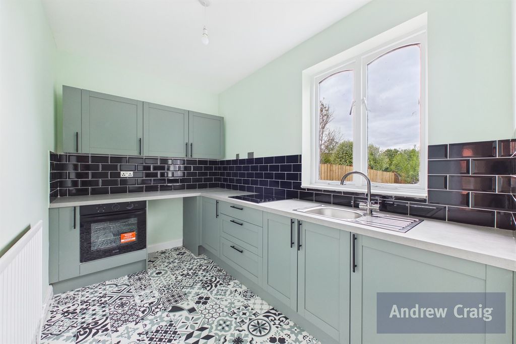 Property photo 2 of 9 Kitchen