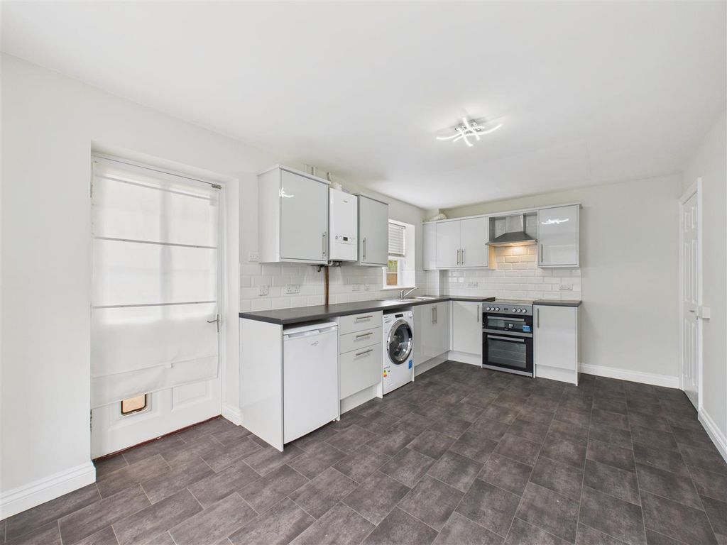 Property photo 3 of 12 Dining Kitchen