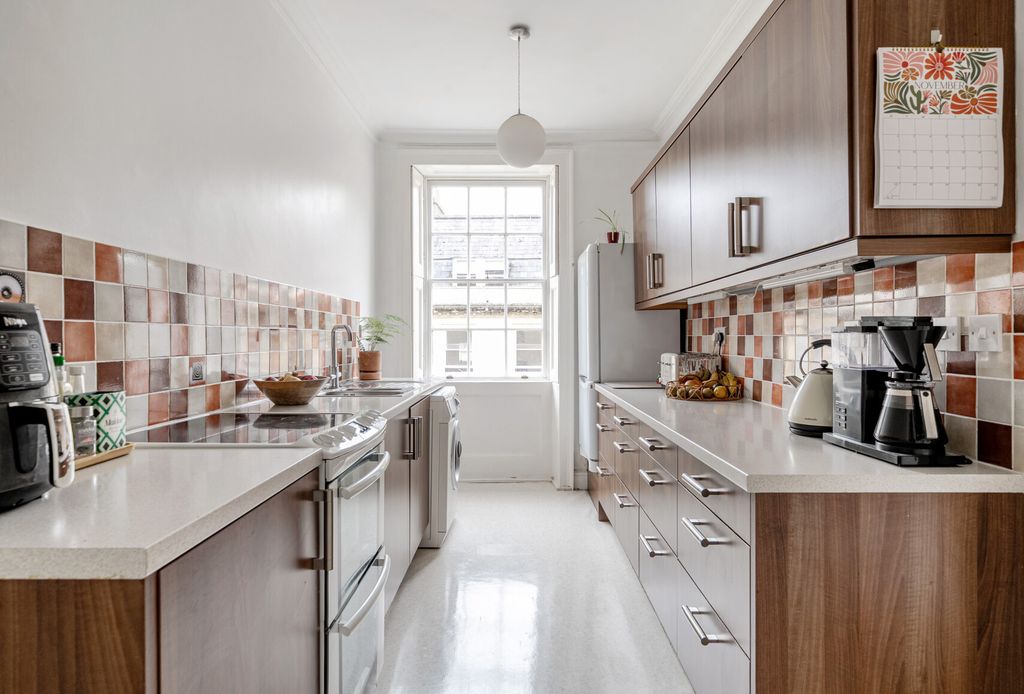 Property photo 3 of 12 Kitchen