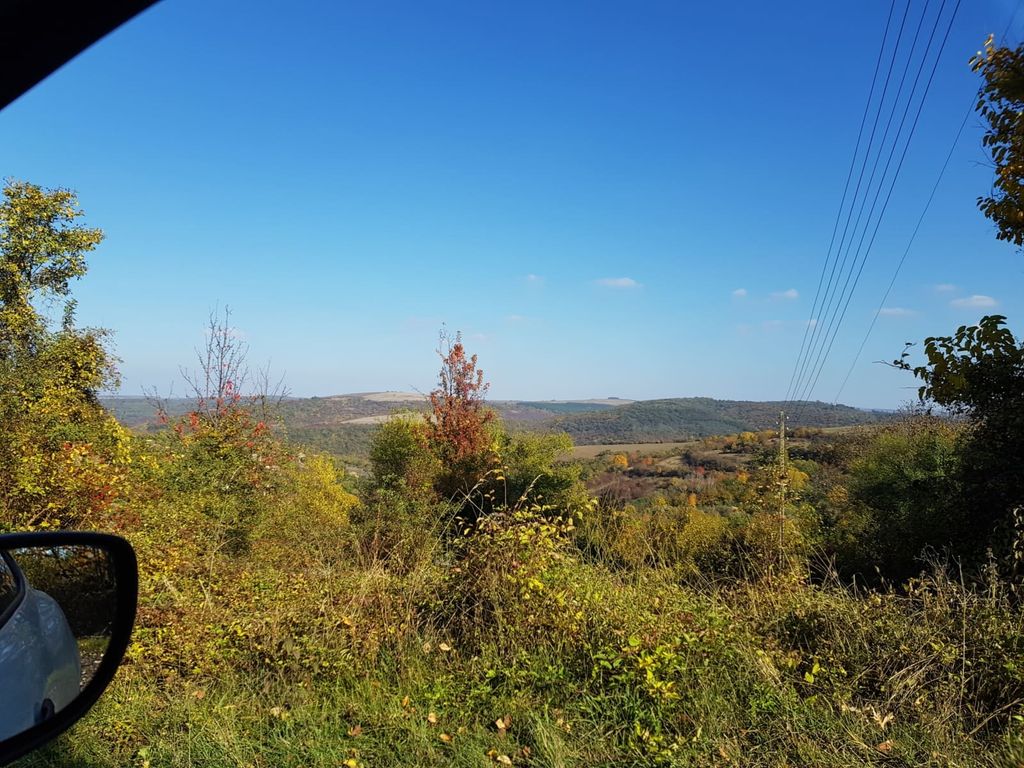 Property photo 2 of 58 Scenic View Of Countryside Hills And Trees Under A Clear Blue Sky