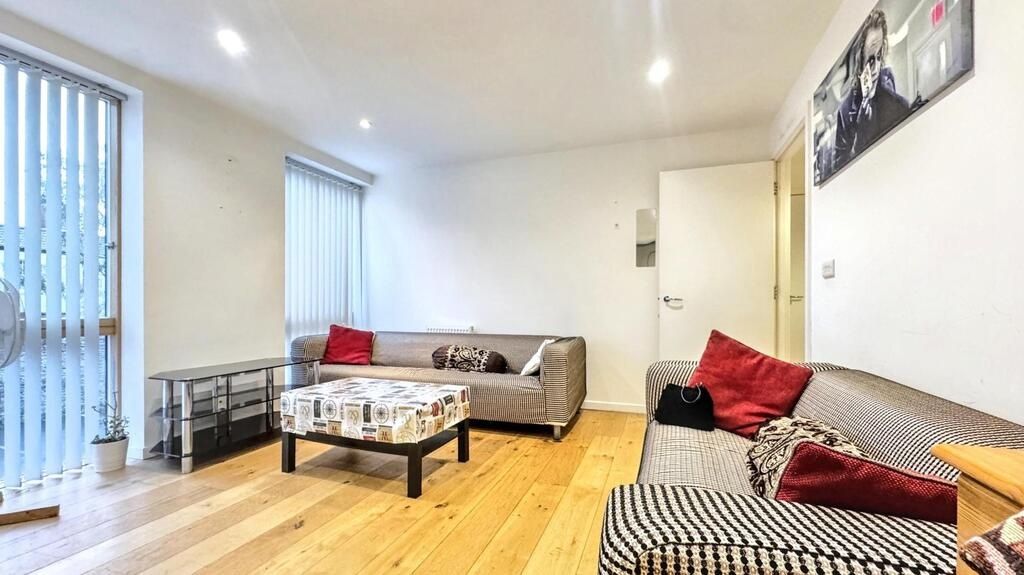 Property photo 2 of 10 Bright Contemporary Living Room With Wooden Floors...