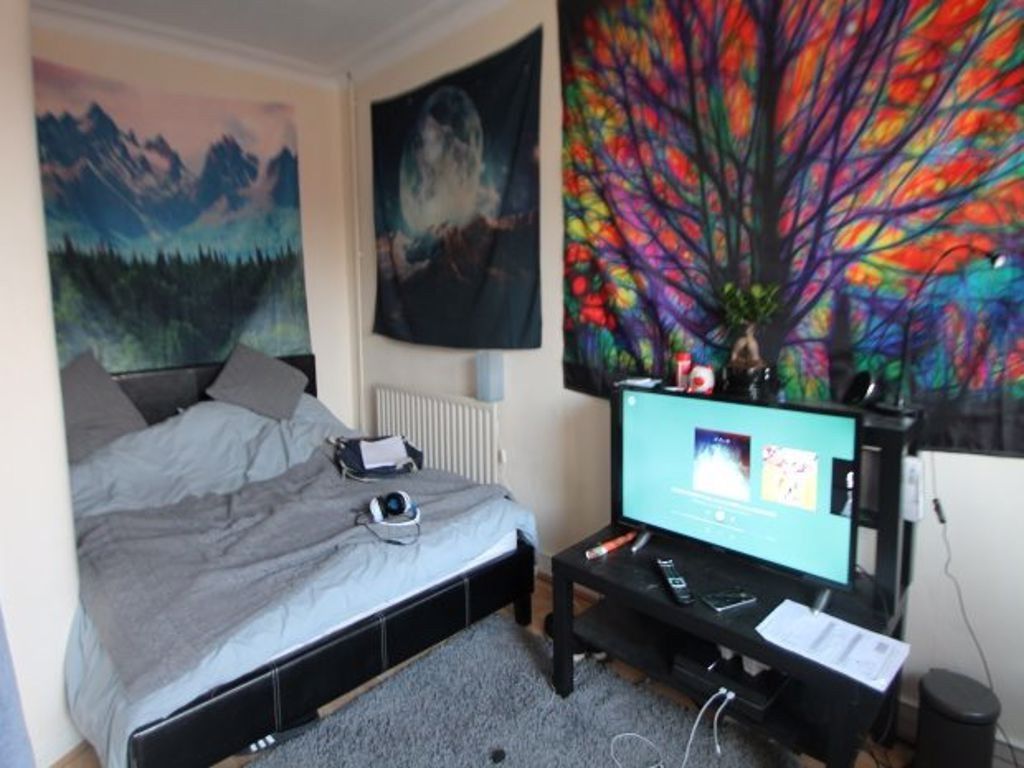 Property photo 1 of 9 A Spacious Master Bedroom Featuring A Large Bed, W...