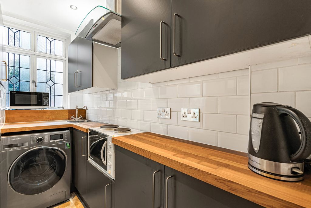 Property photo 3 of 12 Kitchen