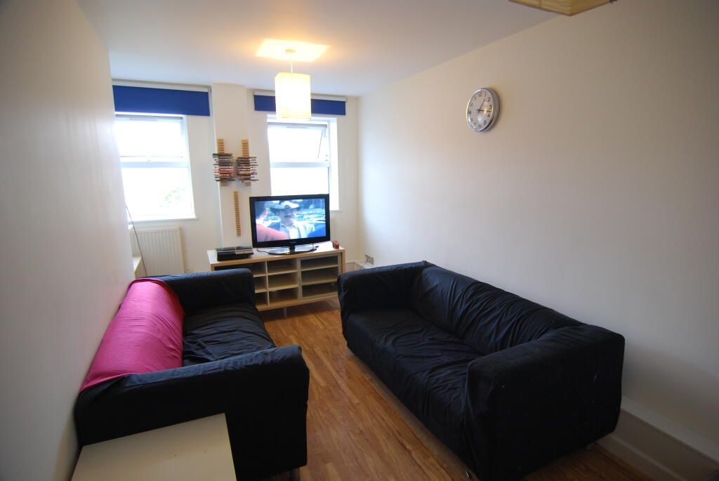 Property photo 2 of 3 A Cozy Living Room Featuring Two Comfortable Sofas...