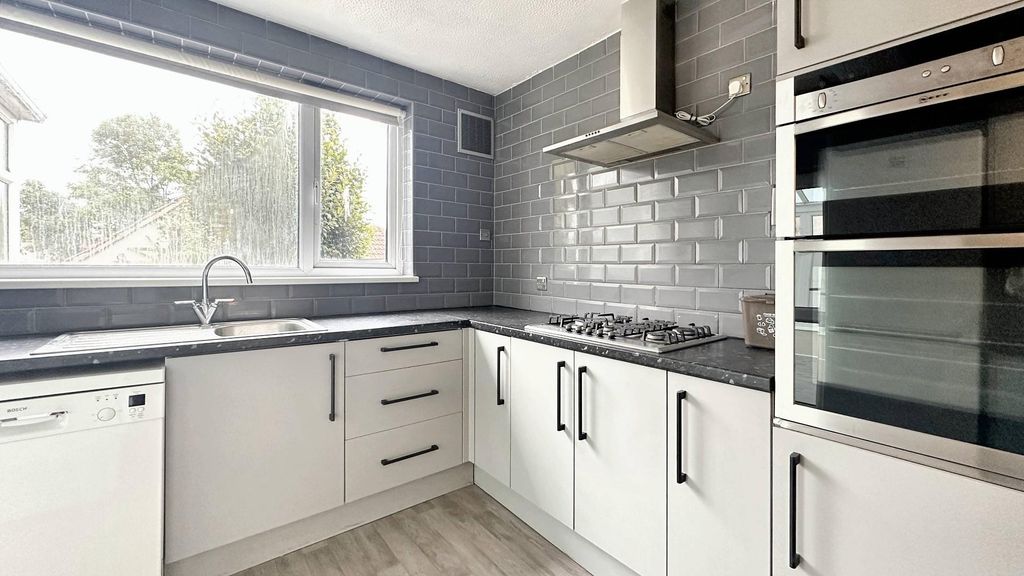 Property photo 1 of 14 Bright Kitchen With Modern Tiling And Sleek Oven...