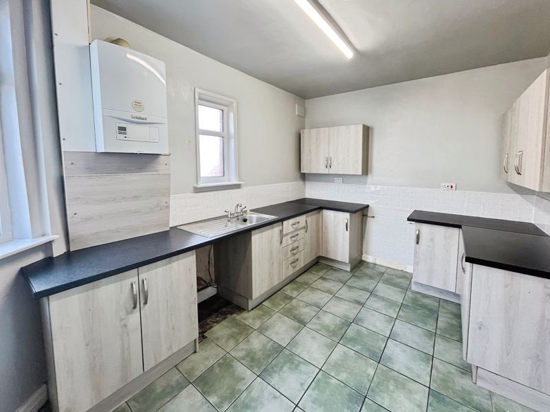 Property photo 3 of 11 Kitchen