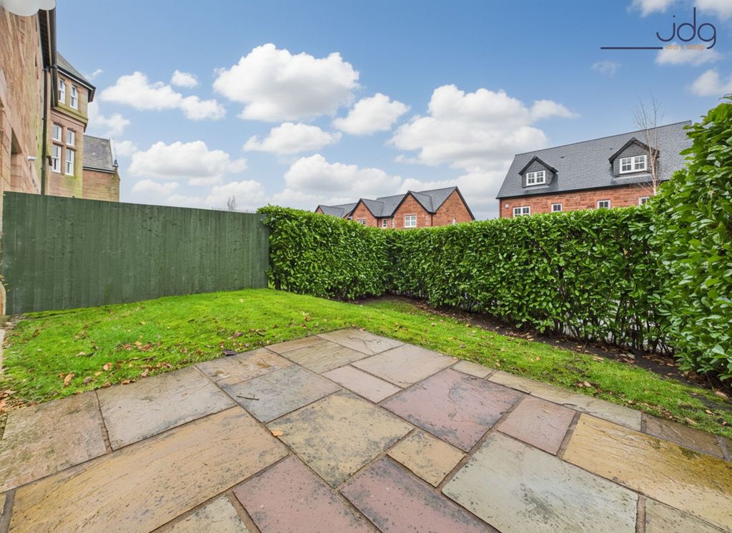 Property photo 2 of 11 Spacious Garden With A Mixture Of Lawn And Flagstone