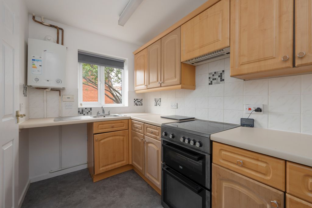 Property photo 3 of 12 Kitchen