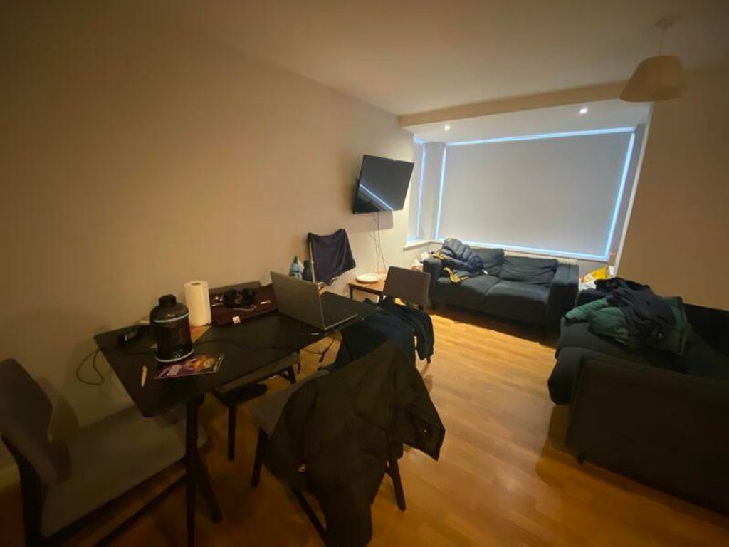 Property photo 2 of 7 A Spacious Living Room With Ample Natural Light, P...