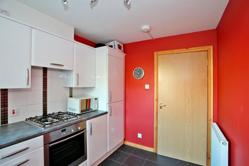 Property photo 3 of 8 Kitchen