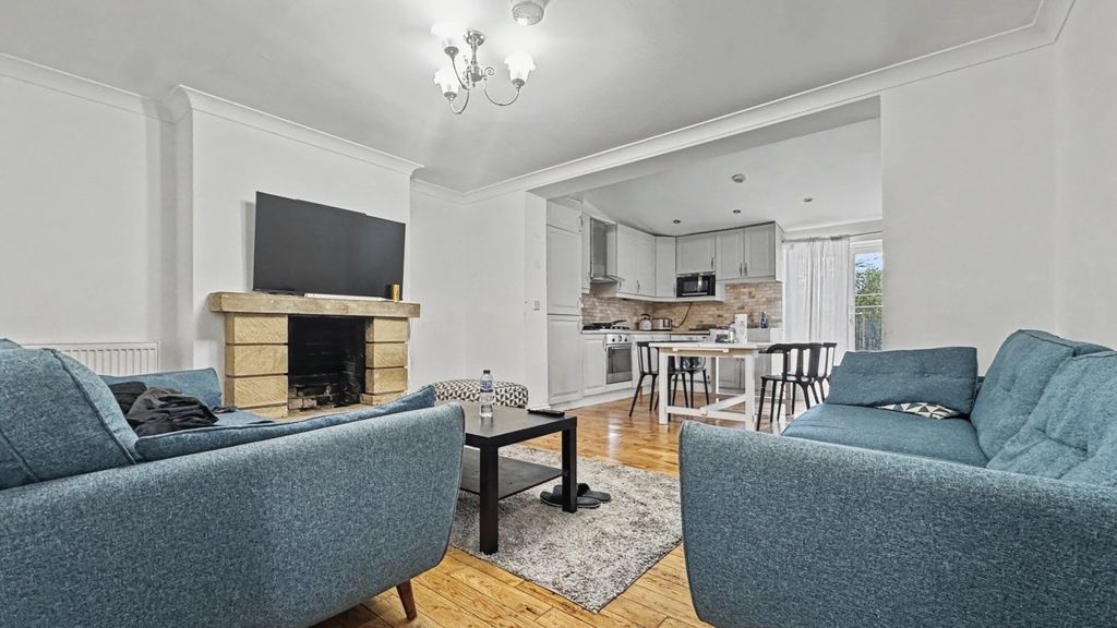 Property photo 1 of 12 Bright, Modern Open-Plan Living Area With Stylish ...