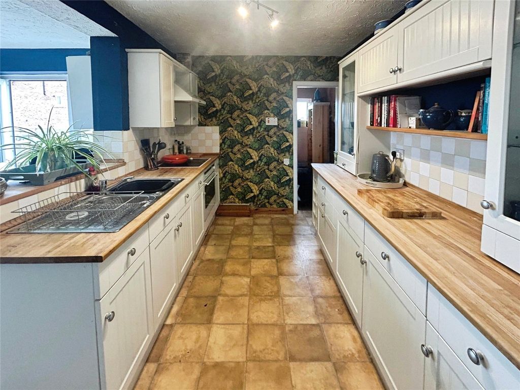 Property photo 2 of 23 Kitchen Area