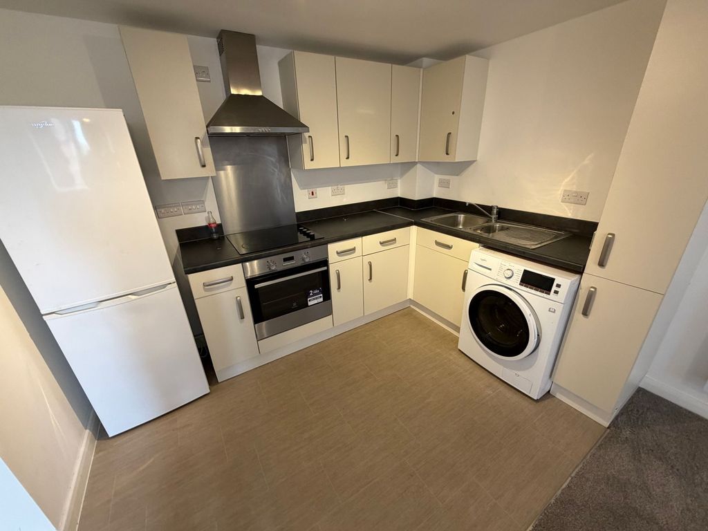 Property photo 3 of 5 Kitchen Area