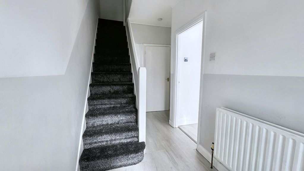 Property photo 2 of 8 Bright And Modern Hallway With Stylish Flooring...