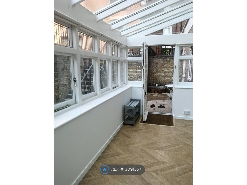 Property photo 3 of 17 Conservatory