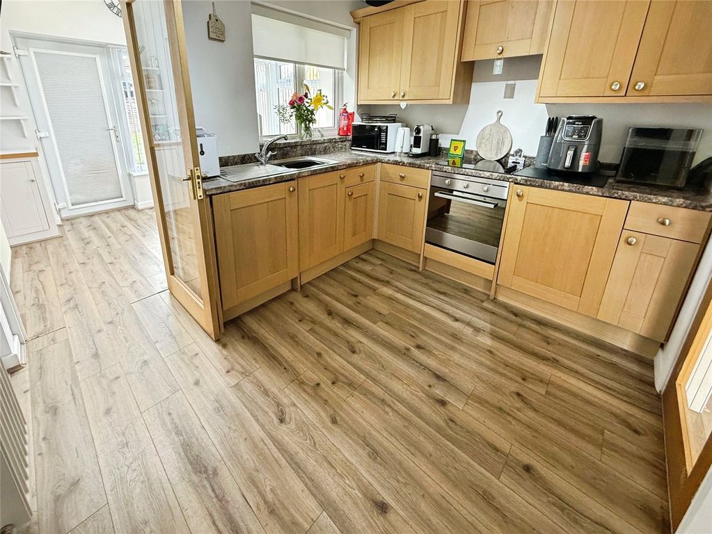 Property photo 3 of 14 Breakfast Kitchen