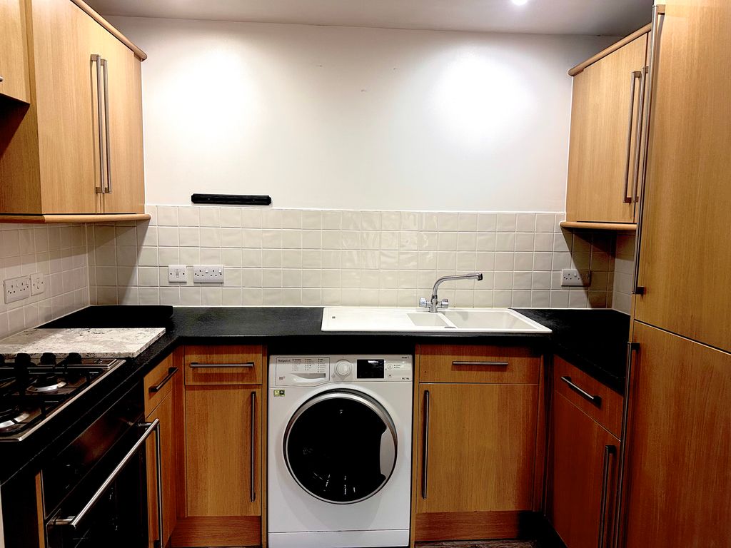 Property photo 3 of 7 Kitchen